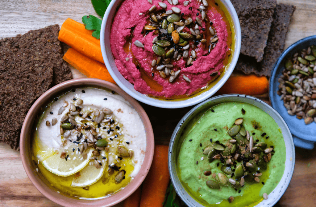 White bean, beetroot dip and artichoke green dip