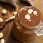 hazelnut chocolate nut butter with roasted hazelnuts on top