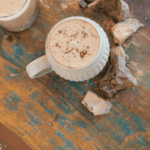 hot chocolate with big chocolate chunks on a wood table