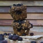 2 banana blueberry muffins stacked on each other