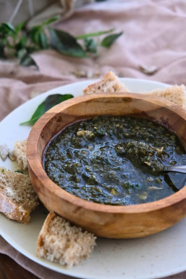 sunflower seed pesto with sourdough bread on white plate