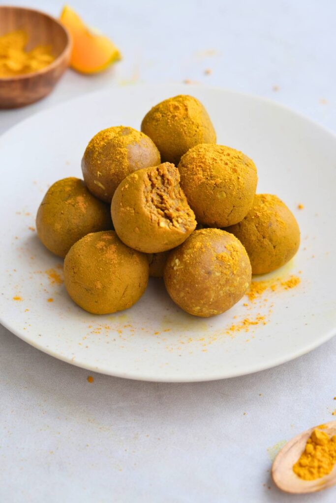 turmeric balls in pile with one bite taken out